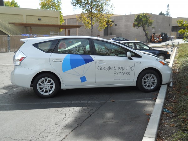 Google Express fleet car with new brand logo
