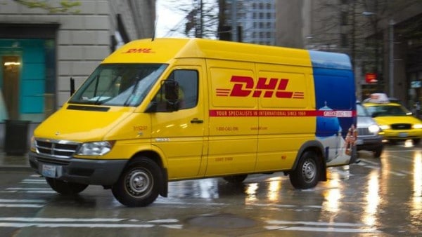 van in DHL brand colors yellow and red